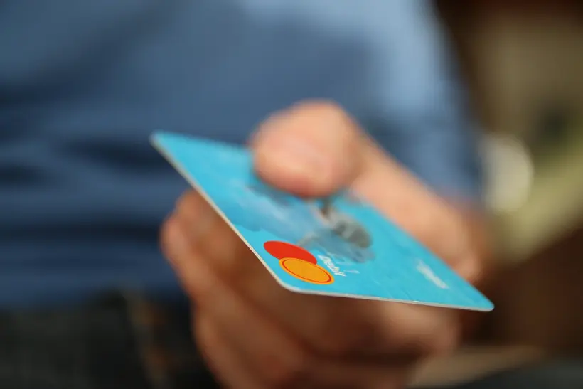 Cash and payment cards representing everyday financial choices