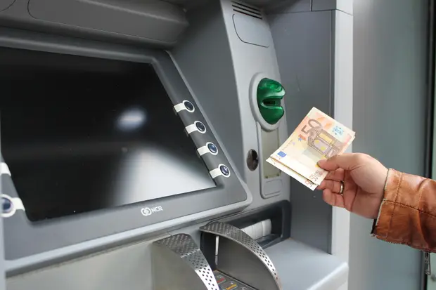 Crypto ATM kiosk screen showing a Bitcoin purchase flow